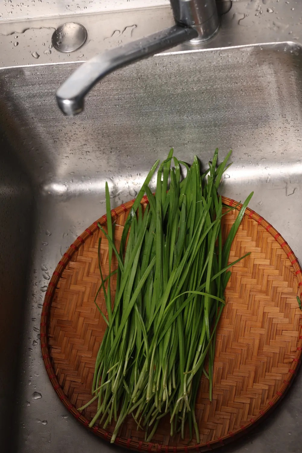 Washed in the sink, on a bamboo basket